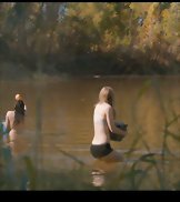 Slinky blonde Brit Marling bares in all in the bath.